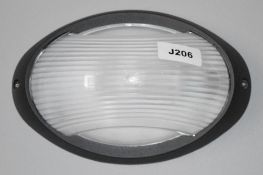 1 x Die Cast Aluminium Black IP44 Oval Outdoor Light - Ex Display Stock - Dimensions (Approx): 21 x