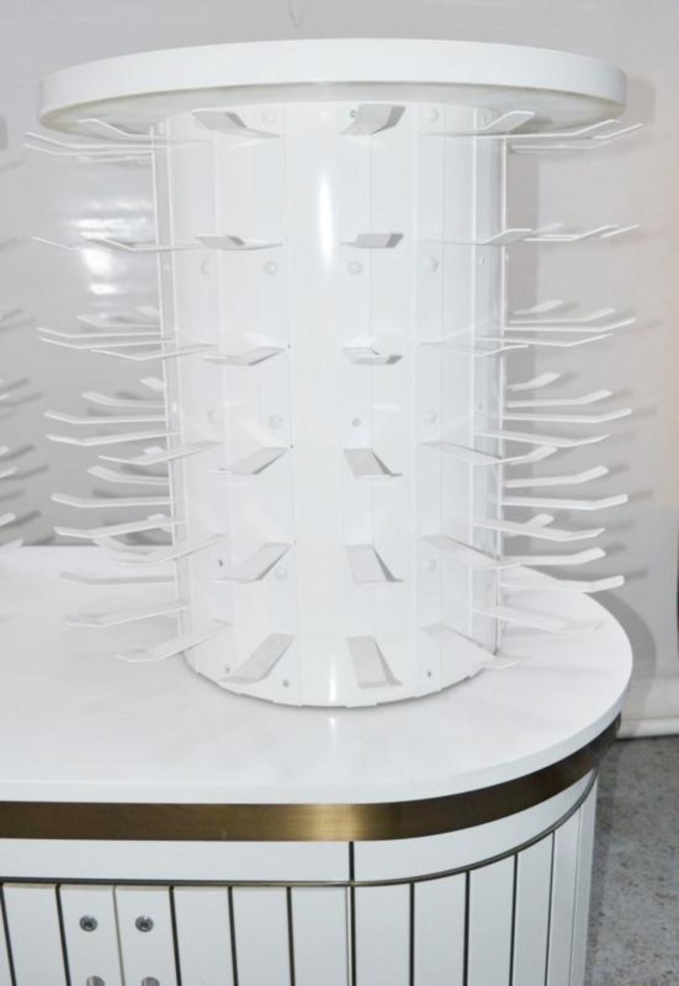 A Pair Of Curved Cosmetics Shop Counters With Revolving Carousels In White - Recently Removed From H - Image 7 of 8