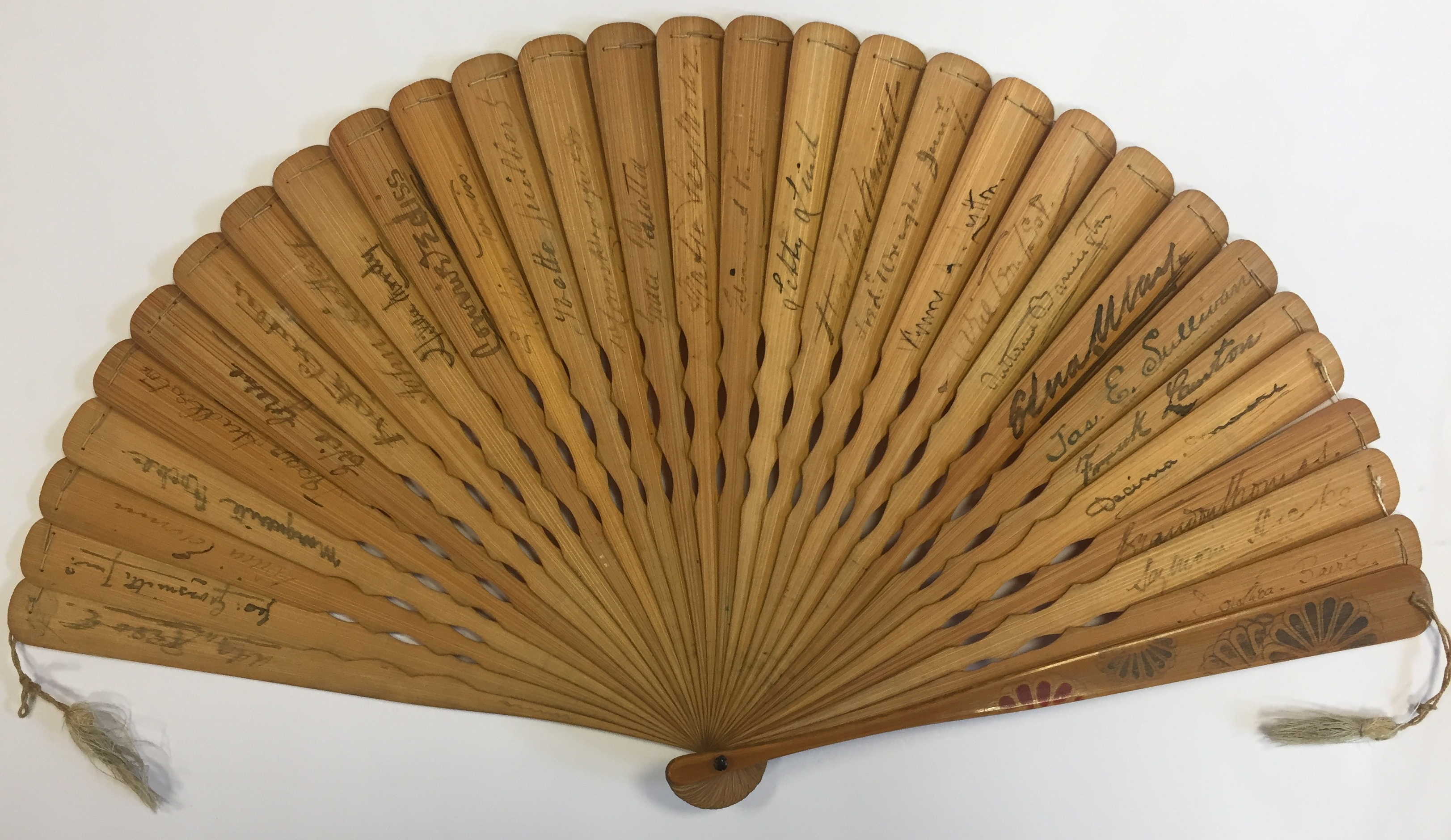 THEATRE: A wooden handheld fan featuring