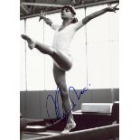 COMANECI NADIA: (1961- ) Romanian Gymnast. Five times Olympic individual gold medallist.