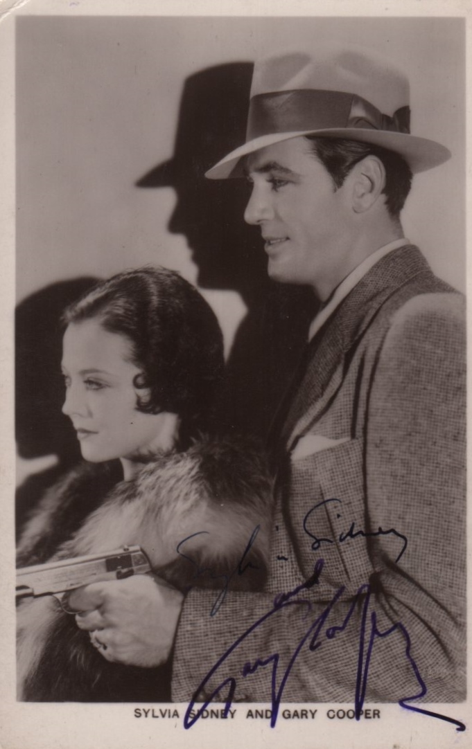 CITY STREETS: A good vintage signed postcard photograph by both Gary Cooper (The Kid) and Sylvia