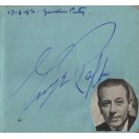 AUTOGRAPH ALBUM: A small autograph album containing over 25 signatures by various film stars and