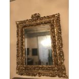 CARVED AND GILDED MIRROR