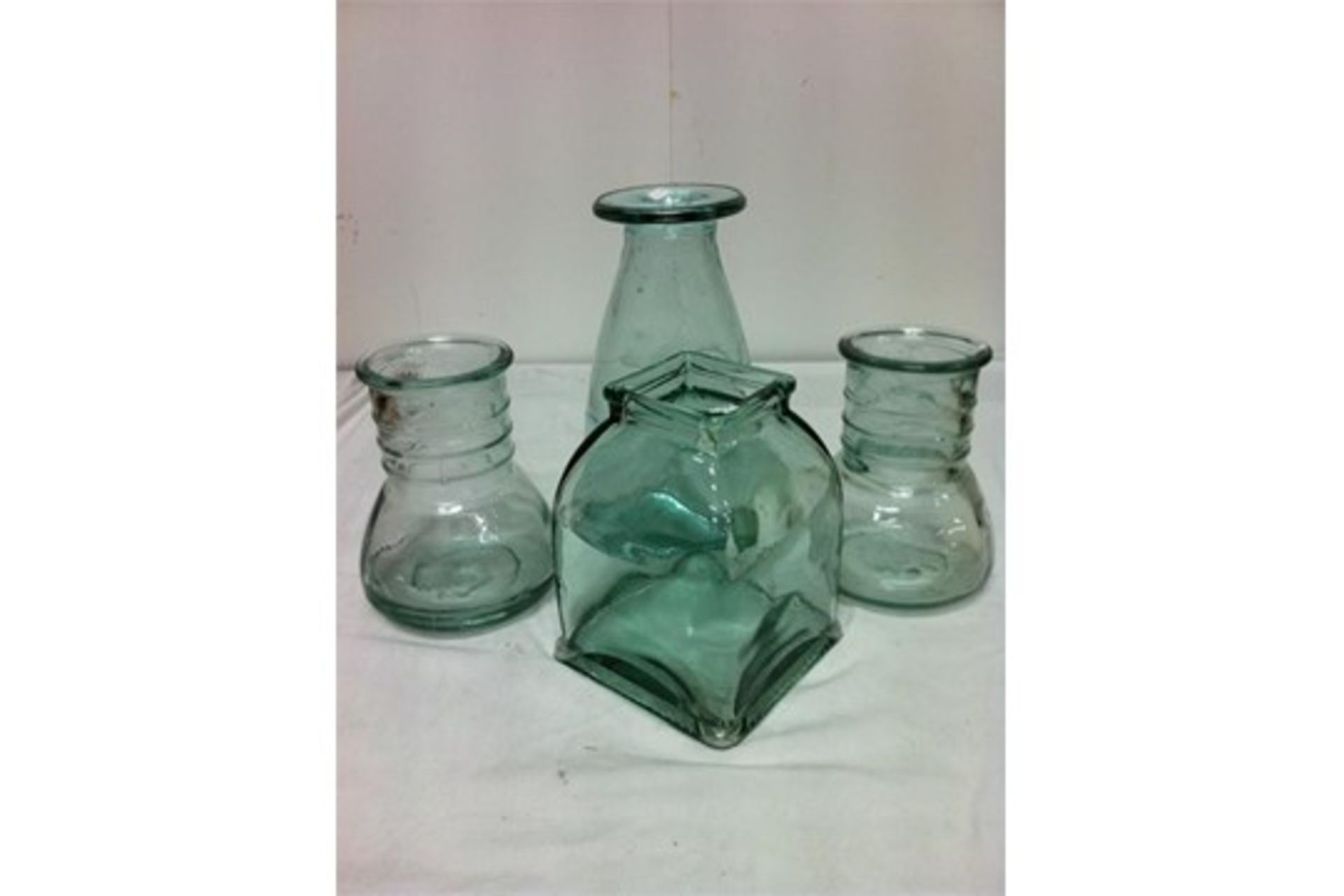 Quantity of 100% recycled glassware; 5 carafes/3 bottles with ceramic tops/4 storage jars/3 candle v - Image 2 of 2