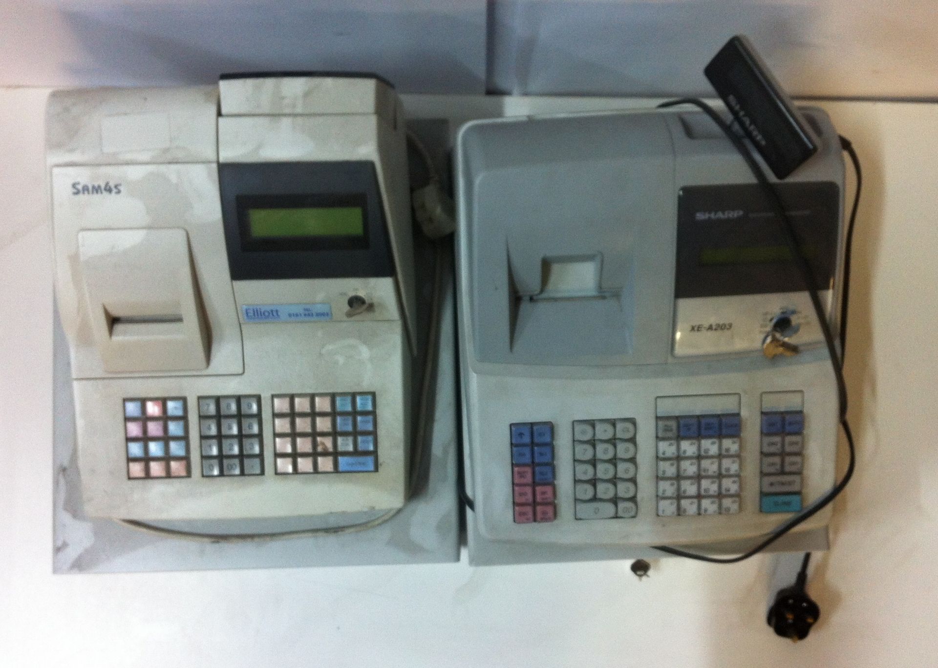 2 x Electronic cash registers. See description