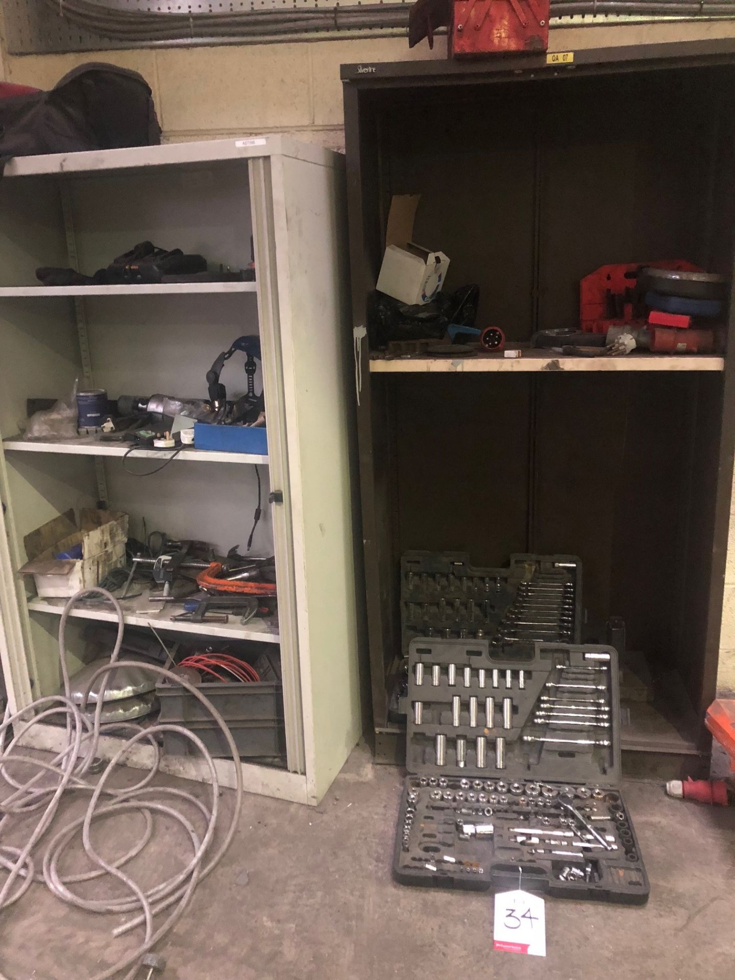 3 Open metal cabinets containing 2 socket sets, sockets and assorted hand tools