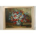 Lilly UNDEN (1908-1989), Oil on canvas: Bouquet of multicolored flowers in a gray [...]