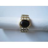 Yellow gold ring set with a sapphire (9.7 x 7.5 cm approximately 3.5-4 ct) oval [...]