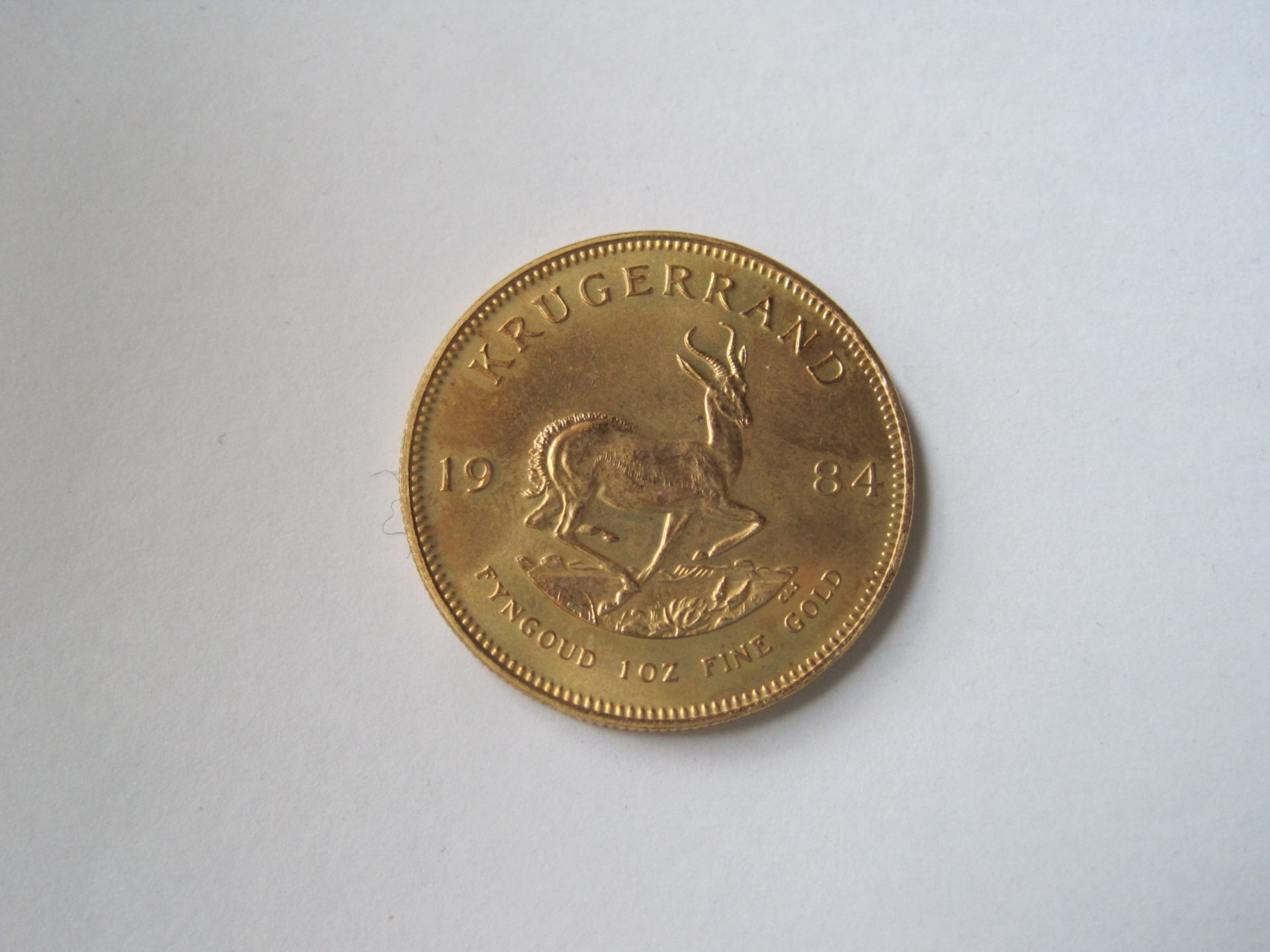 Krugerrand gold coin from South Africa, 1984 - Net weight: 33.93 g - - Pièce en or [...]