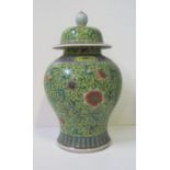 Large nineteenth-century Chinese vase with lid with flower decoration among foliage [...]