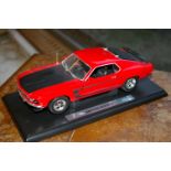 Ford Mustang de 1969, Couleur rouge/noir, support sans la boîte - Marque WELLY - - [...]