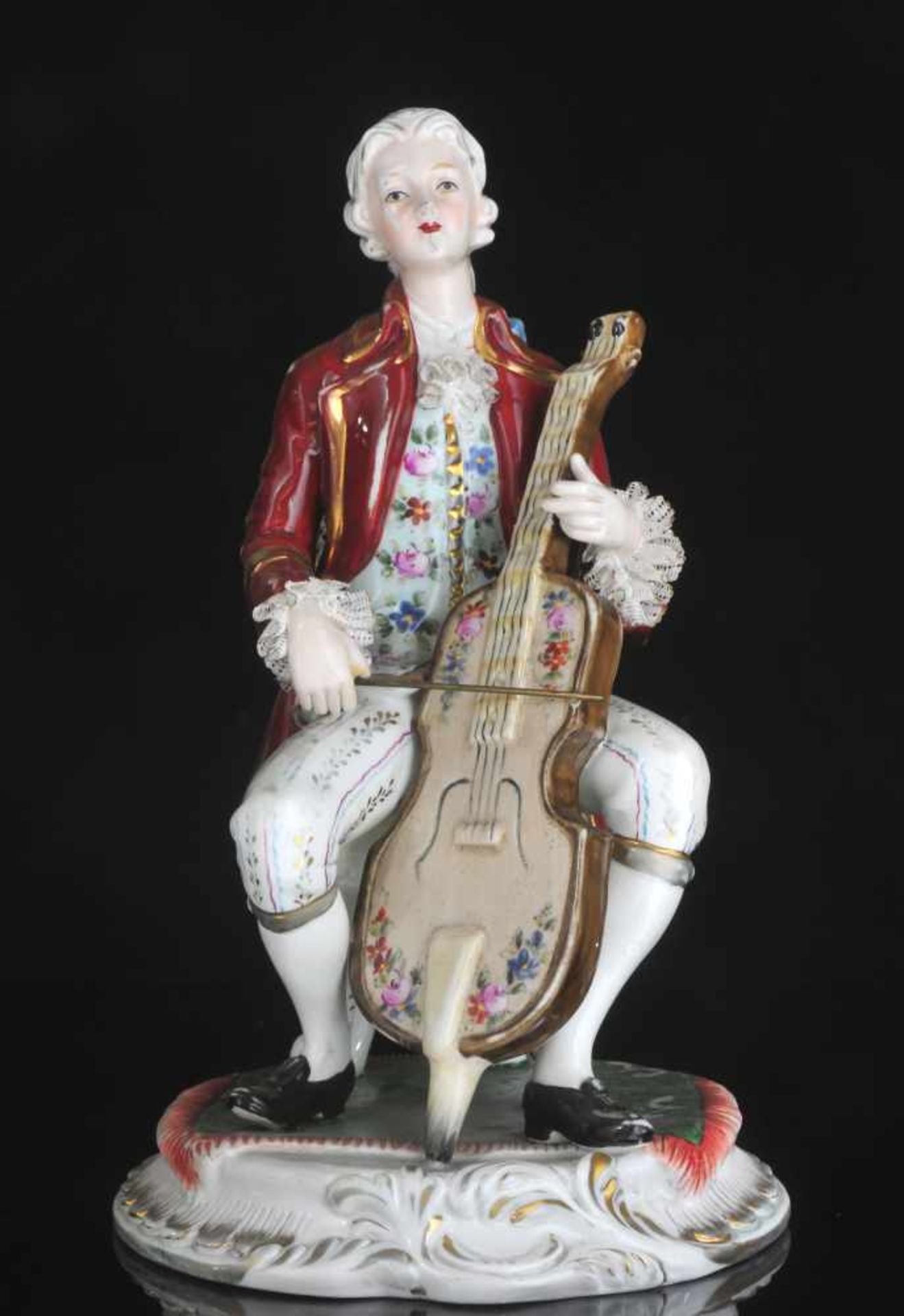 A PORCELAIN FIGURE - CELLIST, GERMANY LATE 19TH / EARLY 20TH CENTURYOrigin: Germany, late 19th to