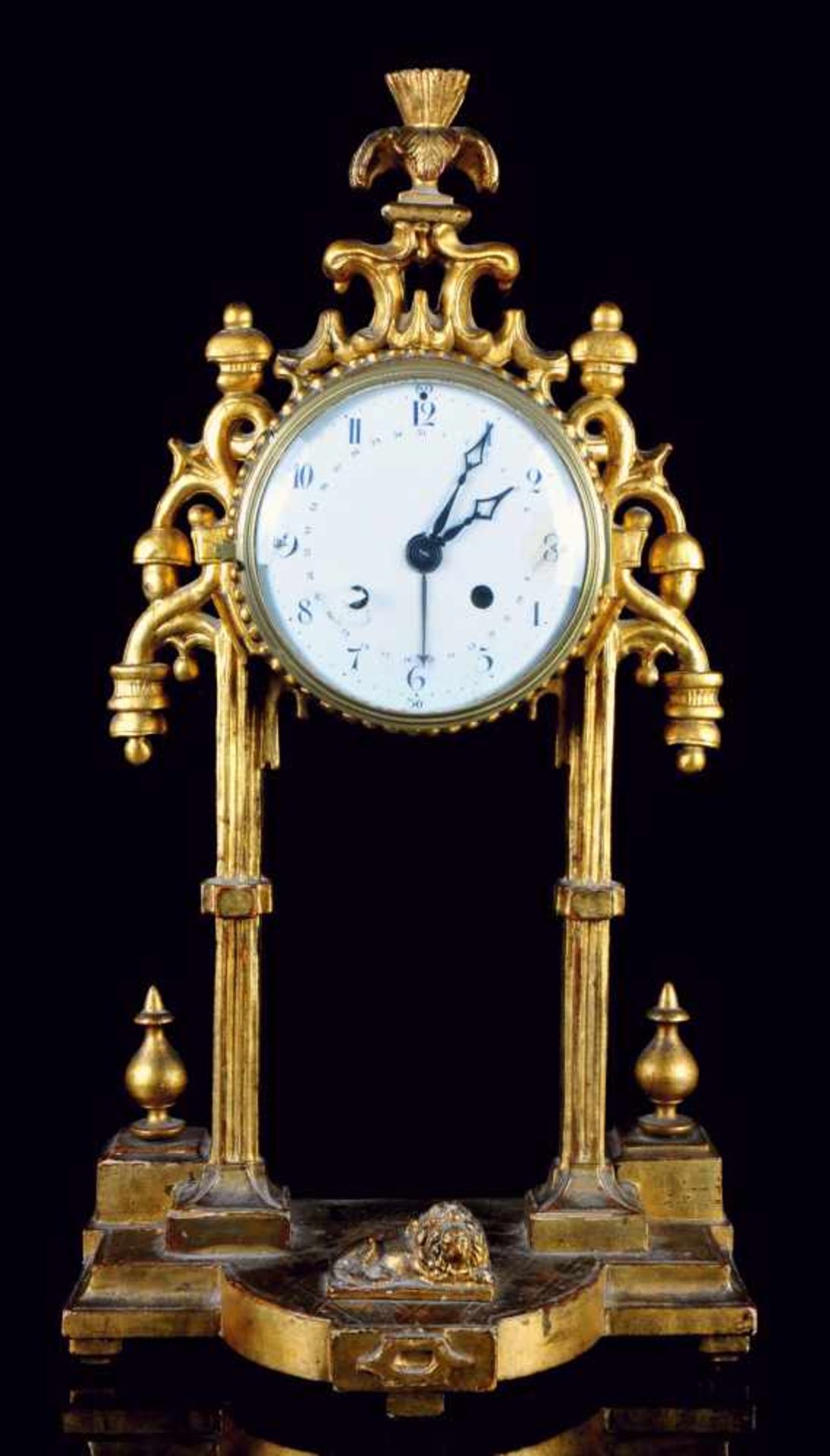 AN AUSTRIAN NEOCLASSICAL PORTAL CLOCK WITH CALENDAR, GILT WOOD. AUSTRIA, LOUIS XVI PERIOD, 1787.