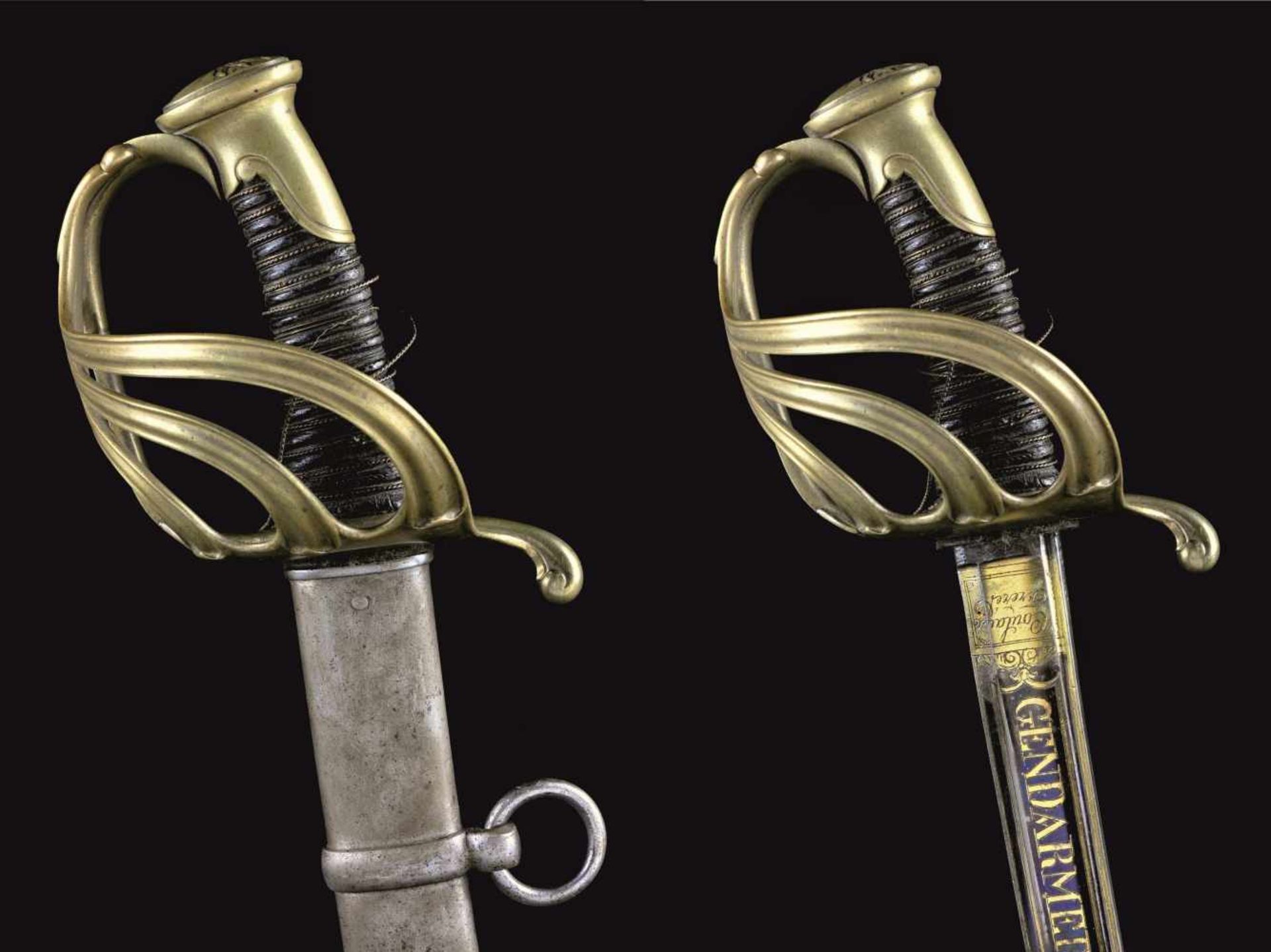 A FRENCH ROYAL GENDARMERIE OFFICER’S SABER, MODEL 1817, COULAUX FRERES, BLUED AND GILT BLADE.