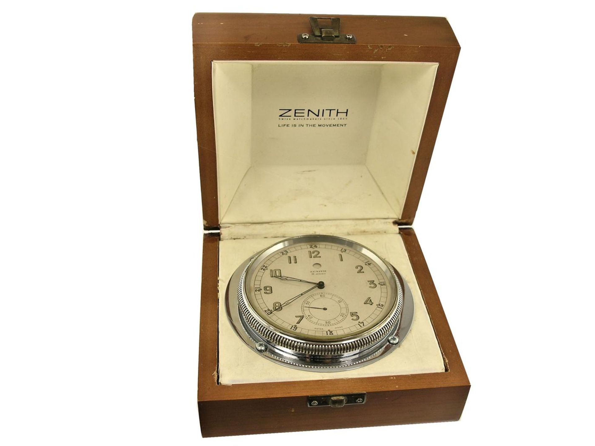 Tischuhr/Borduhr: Zenith 8-Tage-Uhr, ca.1950 Box ca. 14 × 14 × 7,5cm, Deckel mit Zenith-Plakette,