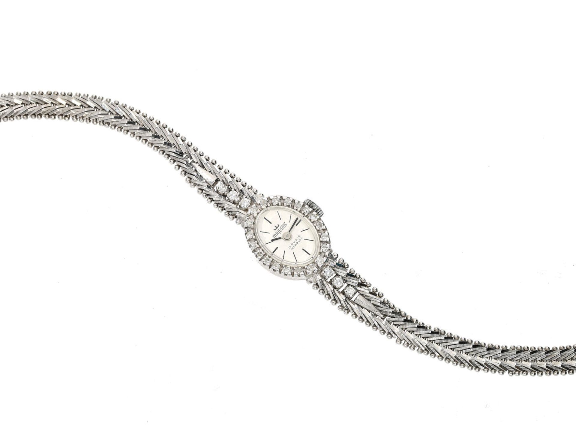 Armbanduhr: weißgoldene vintage Damenuhr mit Diamantbesatz Ca. 21cm lang, ca. 28,3g, 14K Weißgold, - Bild 2 aus 2