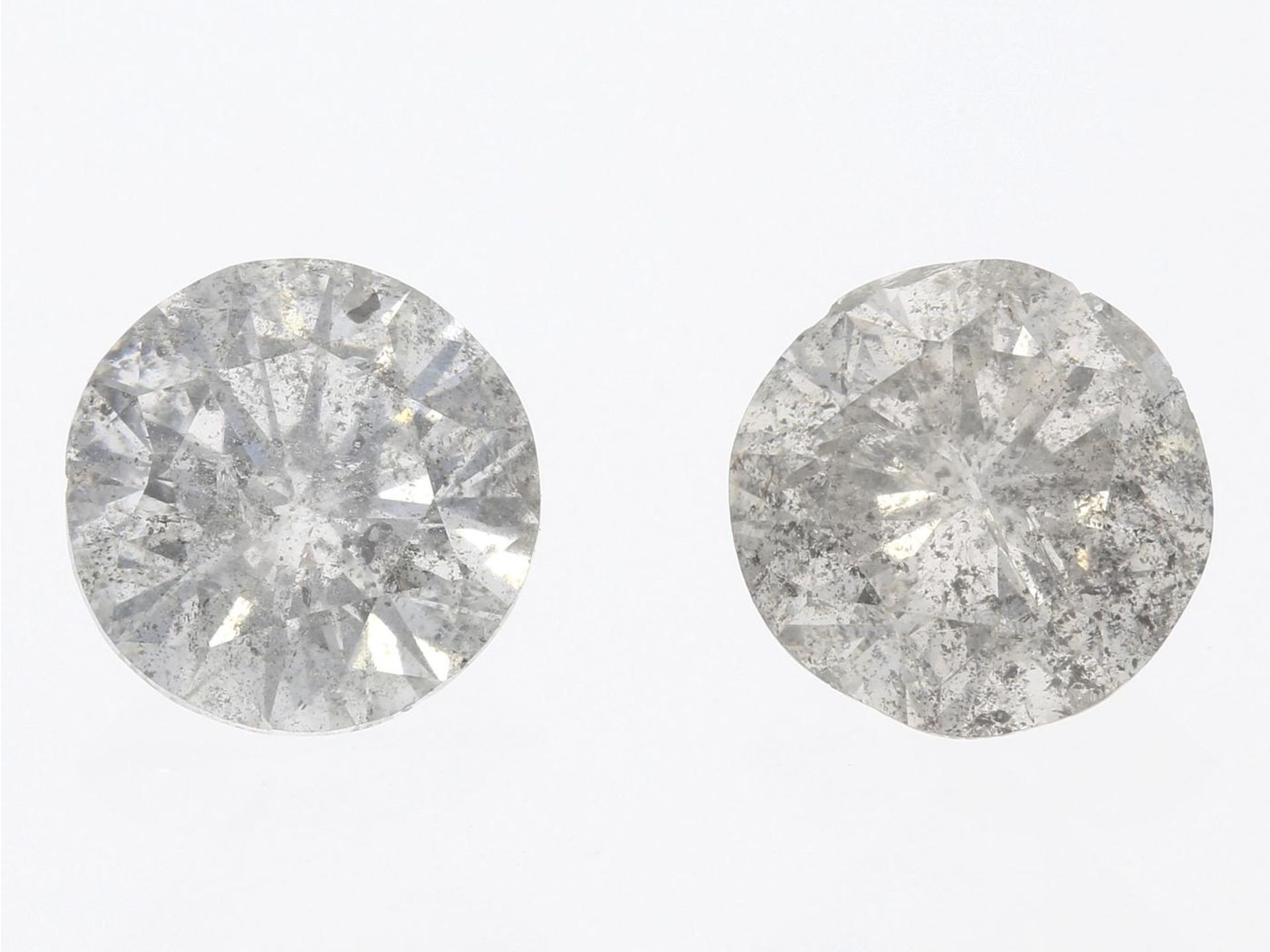Diamant: 2 ungefasste Diamanten im Brillantschliff, 2,1ct, Paar von jeweils ca.1,05ct Ca. Ø6,5mm,