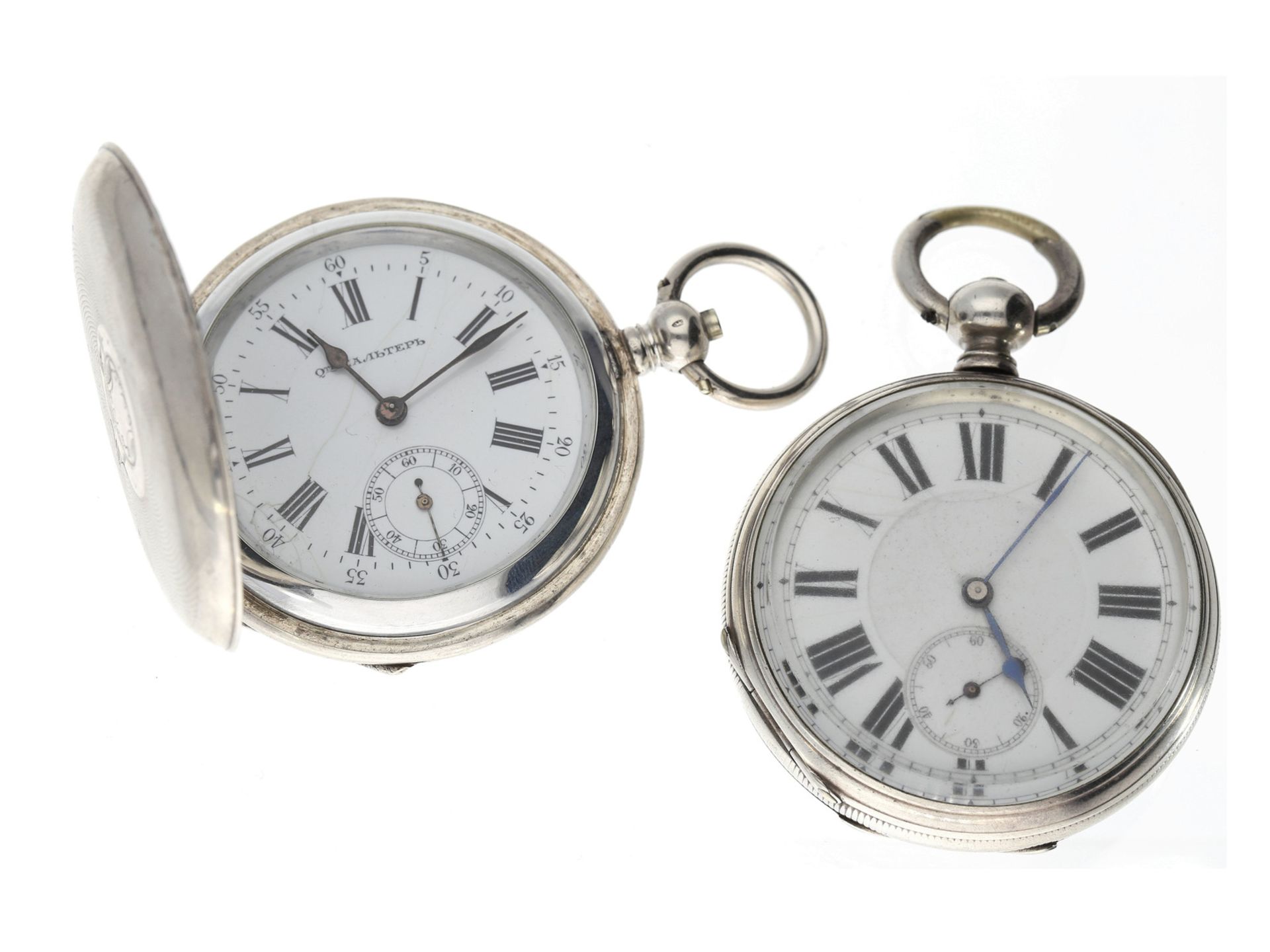 Taschenuhr: 2 interessante Taschenuhren, um 18701. ca. Ø55mm, ca. 97g, Silbersavonnette für den