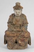 Buddha China, 19. Jahrhundert. Holz. Reste von polychromer Bemalung. H. 35,5 cm. Sitzend mit