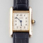 Cartier - Armbanduhr mit Lederband Fa. Cartier, Schweiz. Modell: Tank, Quartz. 925er Silber