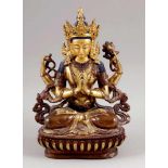 GuanyinChina 20. Jahrhundert. Bronze, teils goldfarben. H. 21 cm. Die Bodhisattva thront in