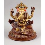 Ganesha FigurIndien. Bronze. Vergoldet und bemalt. H.15 cm. In seinen Händen hält er auf der einen