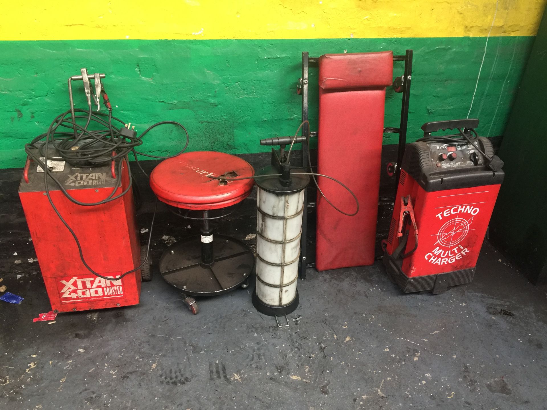 Techno Multi Charger, Xitan 400 Booster, stool, oil drainer and a trolley