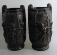 Paar Keramikvasen um 1900, umlaufend mit Puttoszenen, tlw. min. best., h. je 34cm