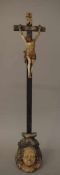 Kruzifix, Franken 18.Jh., Standkreuz auf Sockel mit Puttokopf, 3-Nagel-Typus, Altersschäden, h.