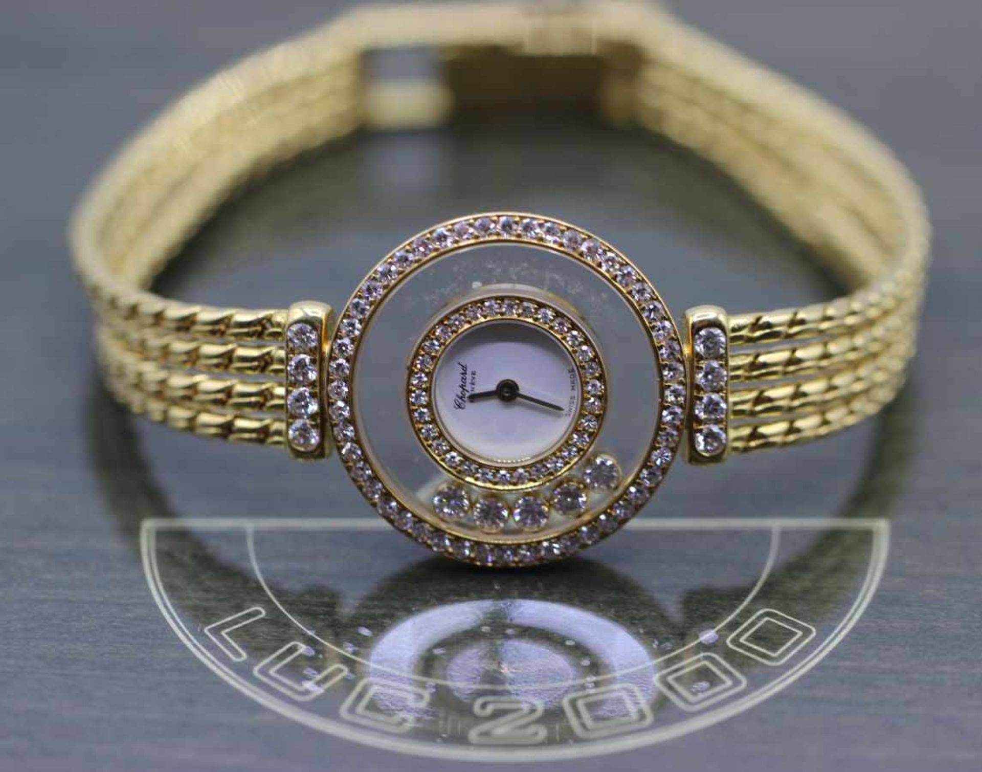 Goldene Brillantuhr - Marke Chopard Paris " Happy Diamonds " mit 5 schwebenden Brillanten unter