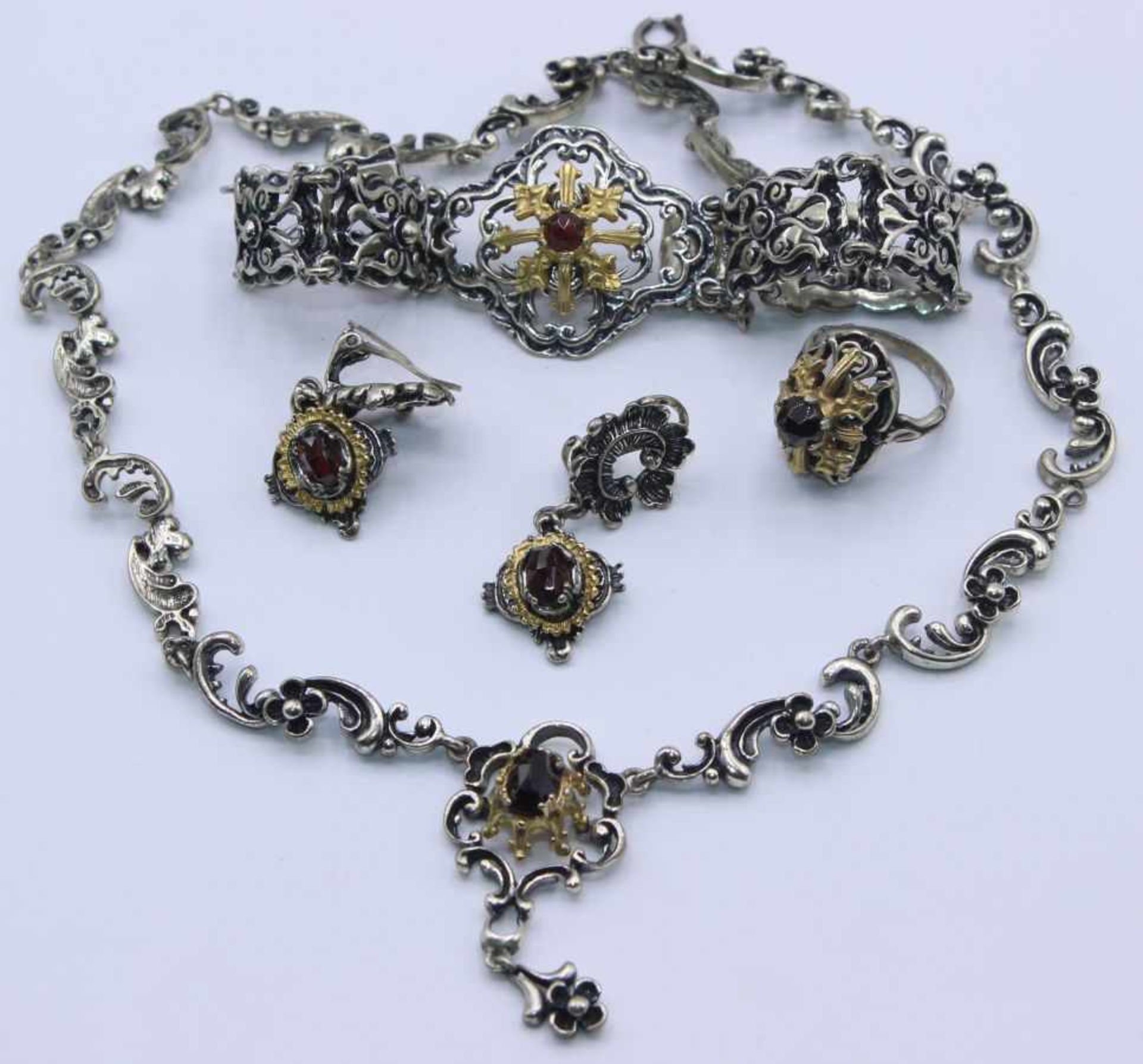 Granatschmuck - Silber gest. 800 teilw. vergoldet, bestehend aus: Collier, Länge 44 cm,