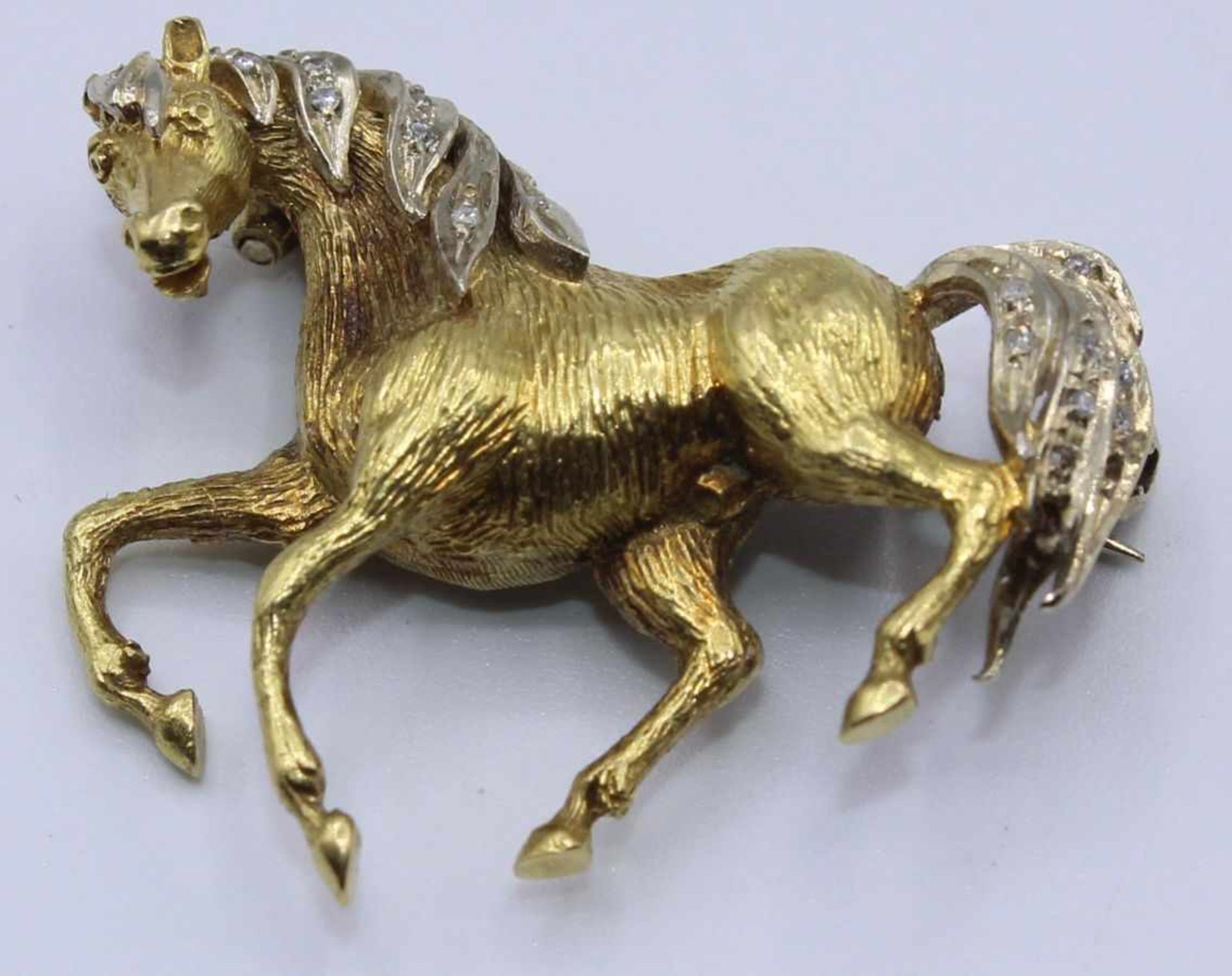 Brillantbrosche - Gelbgold gest. 750 " Trabendes Pferd " mit Brillanten am Schweif und Mähne