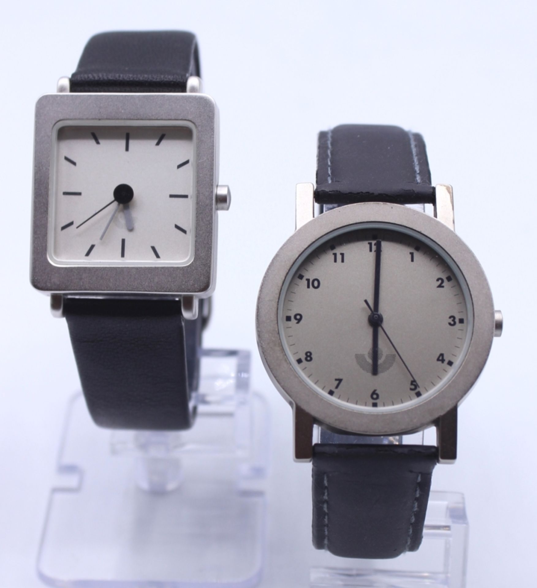 Paar Armbanduhren - Marke Lexon Modell Domino und Modell Laser, mattiertes Metallgehäuse, u.a.