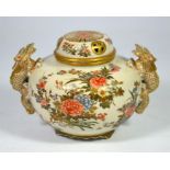 A Japanese Satsuma ware Meiji period (October 23rd 1868 - July 30th 1912) vase and cover