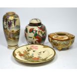 A selection of Satsuma ware, comprising a ginger jar, vase, bowl and a plate