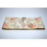 A silk Obi (Kimono Sash), cream with floral patten embroidery