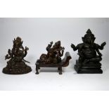 A trio of bronze sculptures of Lord Ganesha the Hindu God