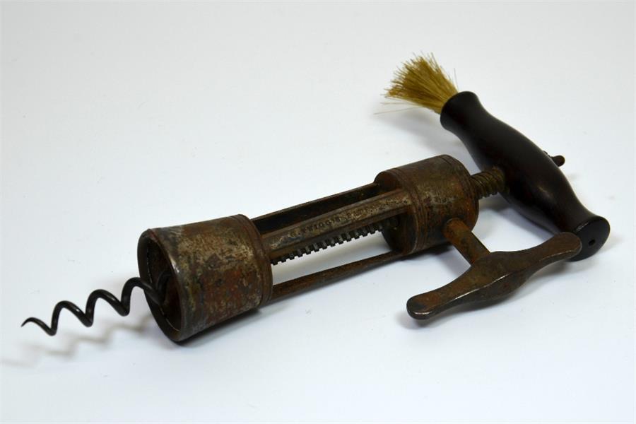 An early 19th century corkscrew with rosewood handle, 'G Twiggs patent'