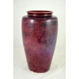 A Ruskin high fired ox blood coloured vase
