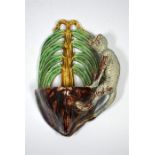 A Palissy Majolica wall pocket, modelled as a monkey in a coconut tree