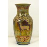 A Pilkingtons Royal Lancastrian lustre vase, decorated with deer amongst trees. Signed Richard Joyce