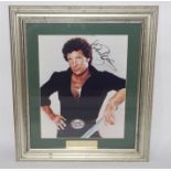 A Tom Jones autographed photograph