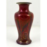 A Pilkingtons Royal Lancastrian lustre vase, decorated with swirling patterns signed Gordon Forsyth