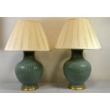 A pair of large sage green ceramic table lamps