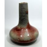 A Ruskin high fired vase, with compressed form and cylindrical neck