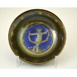 A Pilkingtons Royal Lancastrian lustre bowl, decorated with a child holding a floral garland