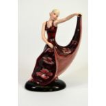 A Goldscheider glazed figure of a posed dancer designed by Stefan Dakon