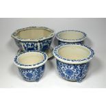 Four modern blue and white Chinese jardinieres, with floral decoration