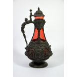 A 19th century Bohemian base metal ruby glass claret jug, renaissance style