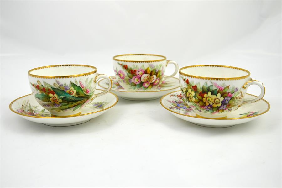 Three Worcester cup and saucers